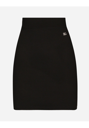 Dolce & Gabbana Short Stretch Viscose Knit Skirt With Dg Logo - Woman Skirts Black 36