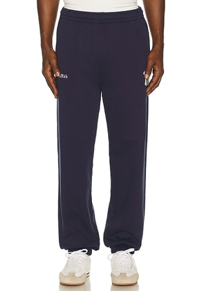 Sporty & Rich Heritage Yankees Serif Sweatpant in Dark Navy - Navy. Size S (also in L, M, XL/1X).