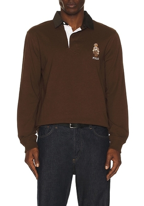 Polo Ralph Lauren Long-sleeve Jersey Knit Novelty Bear Rugby Polo W/ Cord Collar in Branch Brown - Brown. Size S (also in L, M, XL/1X, XXL/2X).