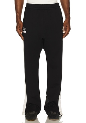 Rhude Lago Hamptons Track Pant in Black  White  & Red - Black. Size S (also in L, M, XL/1X).