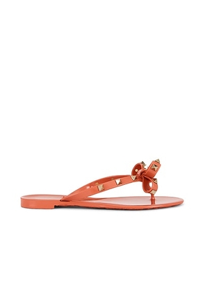 Valentino Garavani Summer Rockstud Thong Sandal in Living Coral - Pink. Size 38 (also in 40, 39, 37).