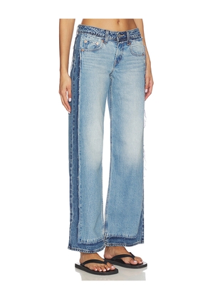 LEVI'S Low Loose Decon in Blue. Size 24. Also in 25, 26, 27, 28, 29, 30, 31, 32.