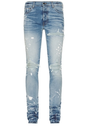 Amiri Painter Denim MX1 Jeans in Faded Indigo - Blue. Size 32 (also in ).