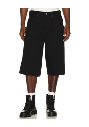 AGOLDE Fusion Skater Short in Black. Size 30. Also in 29.