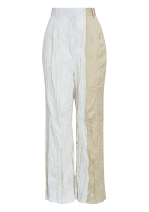 Osklen crinkled trousers - Neutrals