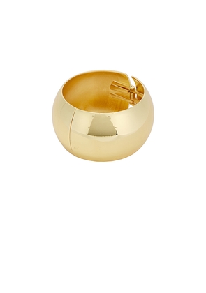 SHASHI Dome Bangle Bracelet in Metallic Gold.