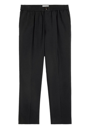 AMI Paris cropped virgin wool tapered trousers - Black