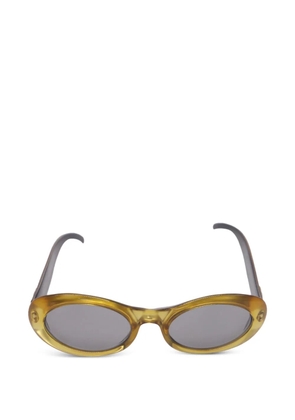 Gucci Pre-Owned Interlocking GG oval-frame sunglasses - Yellow