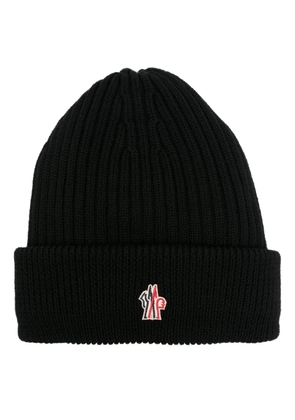 Moncler Grenoble logo-embroidered padded wool beanie - Black