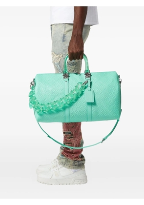 GUAPI embossed-monogram leather chain-strap holdalll - Blue