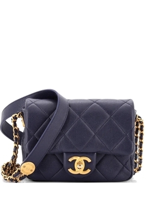 CHANEL Pre-Owned Twist Your Buttons Flap Bag Quilted Caviar Mini crossbody bag - Blue