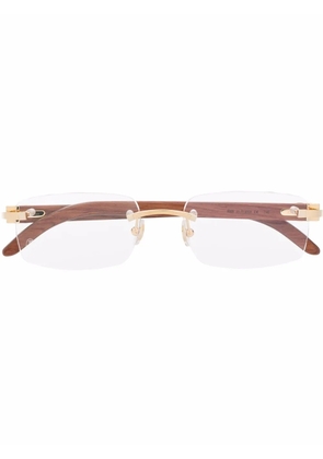 Cartier Eyewear rimless square-frame glasses - Brown