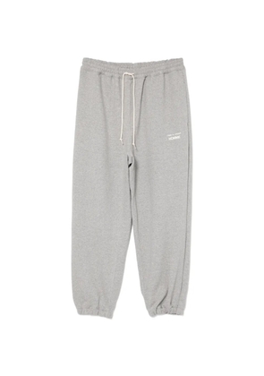 Comme des Garçons Homme logo-print trousers - Grey