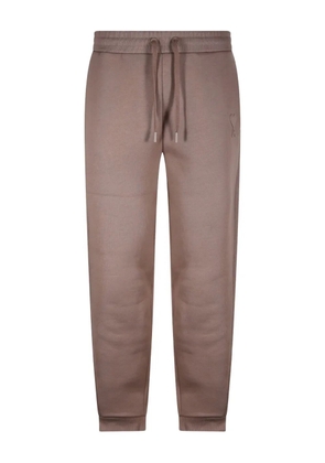 AMI Paris embossed-logo track pants - Neutrals