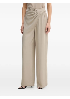 SIMONA CORSELLINI twisted trousers - Neutrals