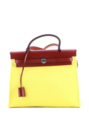 Hermès Pre-Owned Herbag Zip Leather and Toile 31 shoulder bag - Yellow