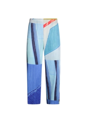 Pleats Please Issey Miyake City Collage printed pleated trousers - Blue
