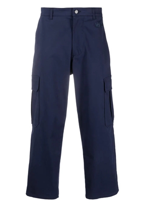 Moschino logo-embroidered cotton cropped trousers - Blue