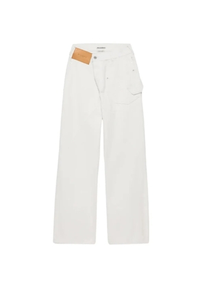 JW Anderson logo-patch denim jeans - Neutrals