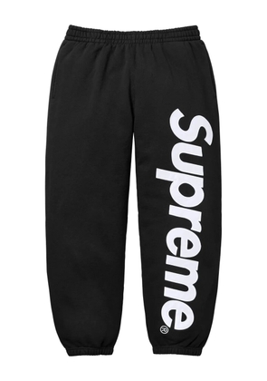 Supreme satin-appliqué track pants - Black