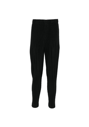 Homme Plissé Issey Miyake plissé tapered trousers - Black
