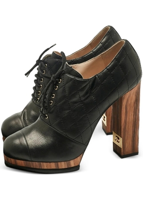 CHANEL Pre-Owned quilted lace-up pumps - Black