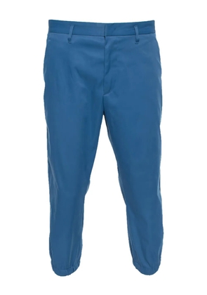 Prada Pre-Owned tapered cotton trousers - Blue