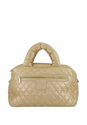CHANEL Pre-Owned 2009-2010 Quilted Metallic Lambskin Coco Cocoon Bowler Bag handbag - Gold