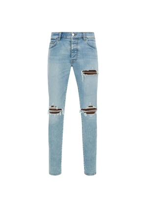 AMIRI Mx1 ripped-design jeans - Blue