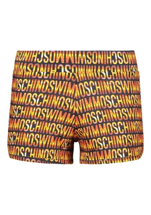 Moschino logo-pattern shorts - Orange