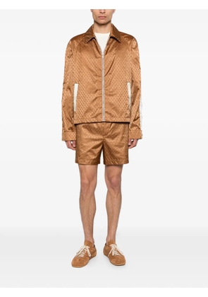 Alexander McQueen skull-print shorts - Brown