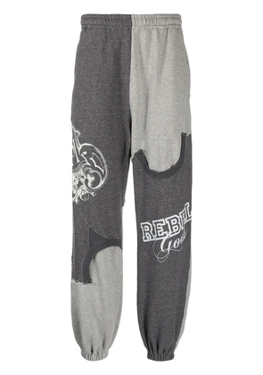 Undercoverism graphic-print track pants - Grey