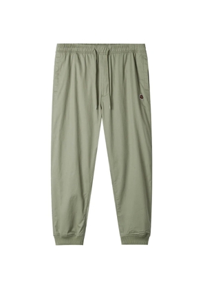 FINGERCROXX logo-patch trousers - Green
