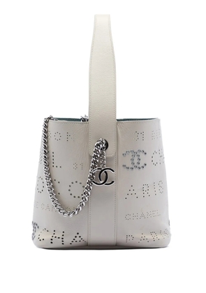CHANEL Pre-Owned 2019 Small Perforated Calfskin Logo Eyelet bucket bag - White