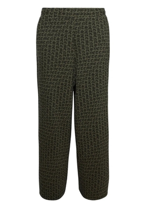 VETEMENTS monogram-print cotton wide-leg trousers - Green