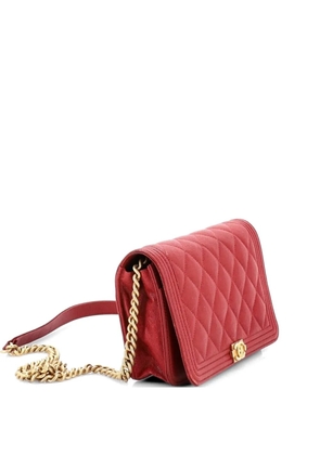 CHANEL Pre-Owned Boy Wallet on Chain Quilted Caviar crossbody bag - Red