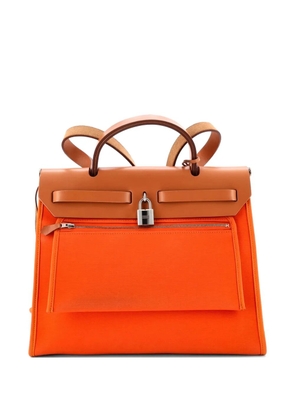 Hermès Pre-Owned Herbag Zip Leather and Toile 31 shoulder bag - Orange