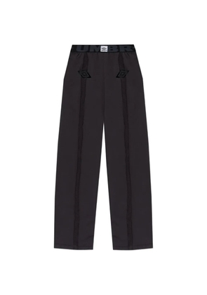 UMBRO logo-patch pants - Black