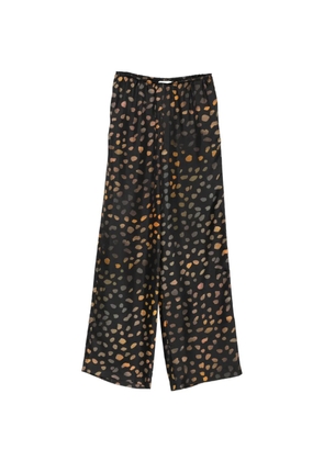 Nanushka elasticated waist dotted trousers - Black