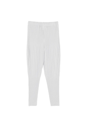 Homme Plissé Issey Miyake pleated tapered trousers - Blue