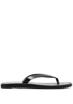 The Row thong-strap leather flip flops - Black
