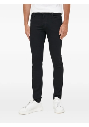 GUESS USA Chris logo-patch jeans - Black
