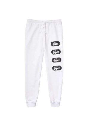 Lacoste crocodile-print track pants - White