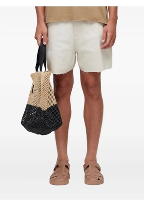 Osklen frayed-hem denim shorts - White