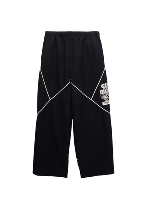 Honor The Gift graphic-print trousers - Black