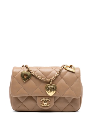 CHANEL Pre-Owned 2021-2025 Mini Rectangular Quilted Lambskin Heart Charms Flap crossbody bag - Brown