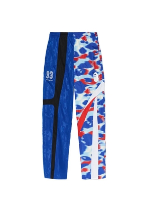 A BATHING APE® star print panel trousers - Blue