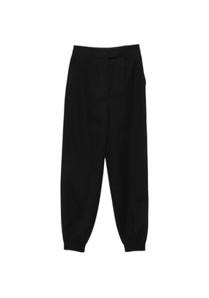 Prada Pre-Owned wool tapered trousers - Black
