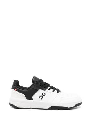 On perforated sneakers - White