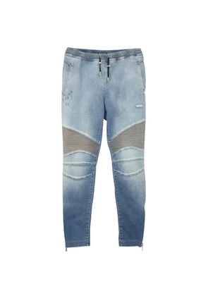Balmain Pre-Owned ribbed-panel trousers - Blue